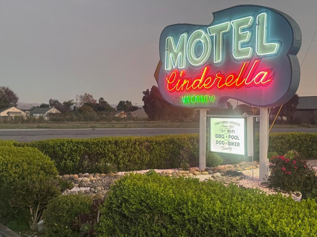 a sign for a motel in the middle of a street at Cinderella Motel in Hollister