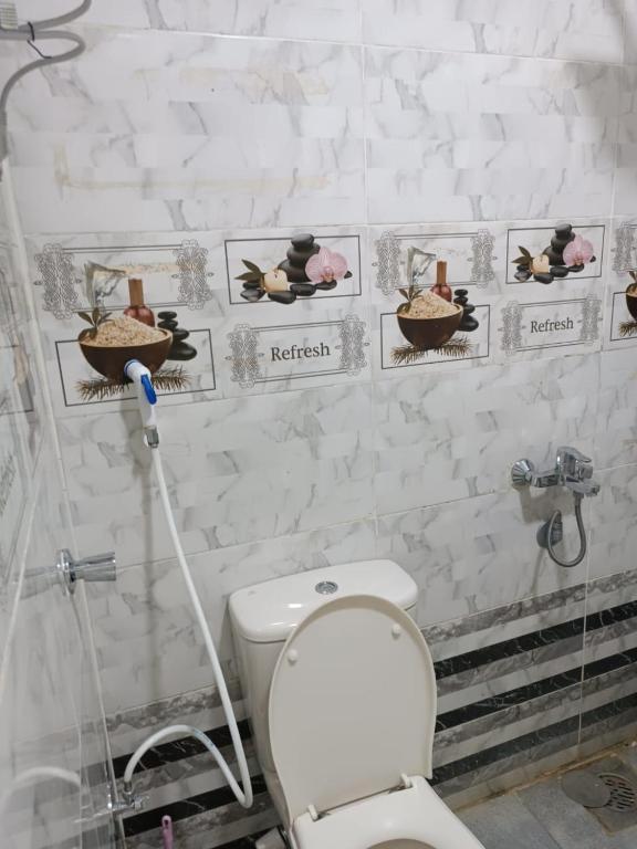 Koupelna v ubytování فندق الإيمان El Eman Hotel