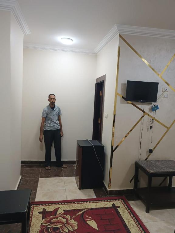 TV a/nebo společenská místnost v ubytování فندق الإيمان El Eman Hotel