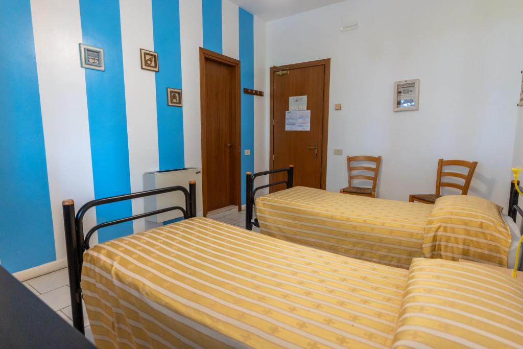 Cama o camas de una habitación en Il Lato Azzurro