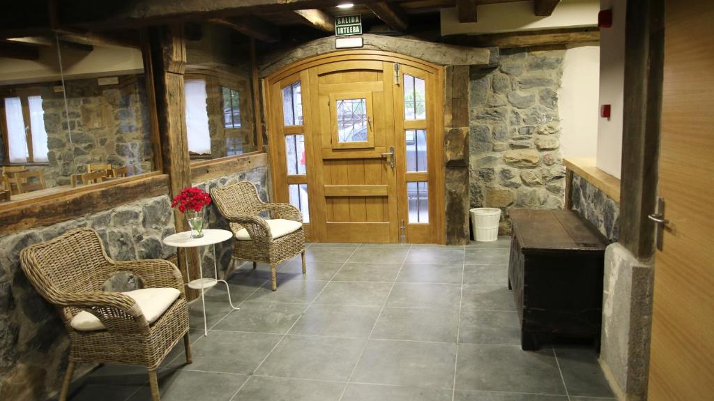 Posezení v ubytování Hostal-Cicloturismo Lopenea