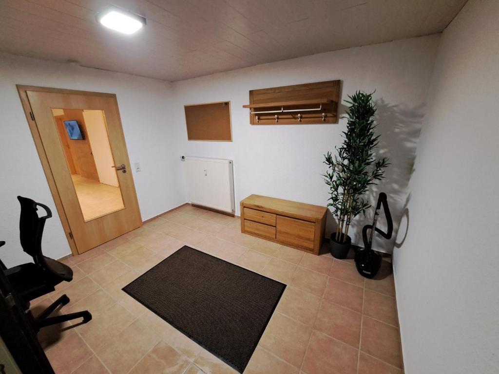 Posezení v ubytování Sonnen 1 - Erdgeschoss-Wohnung mit Arbeitszimmer und Parkplatz
