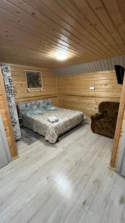 Postel nebo postele na pokoji v ubytování Sadyba Dana