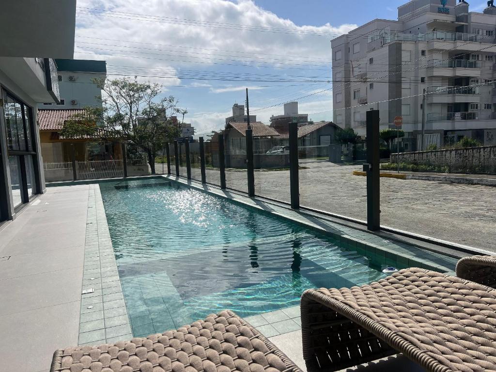 Bazén v ubytování Piscina no condominio! Apto em Palmas! OJ04I nebo v jeho okolí