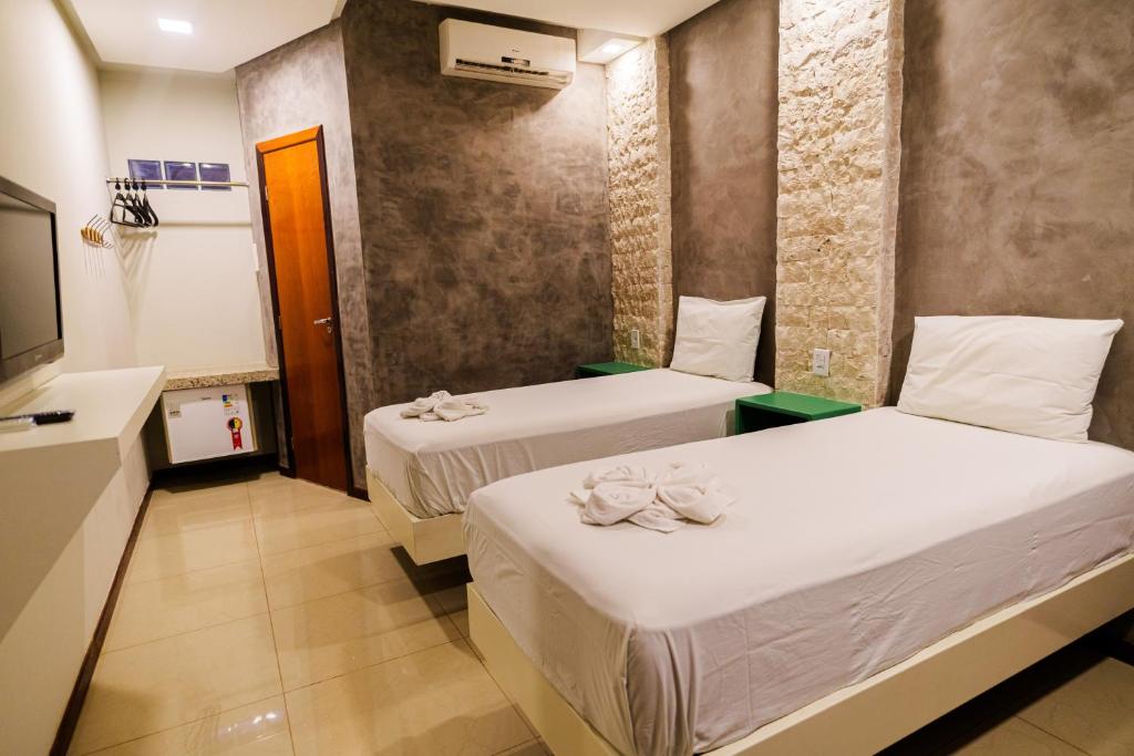 Postel nebo postele na pokoji v ubytování W4 Hotel