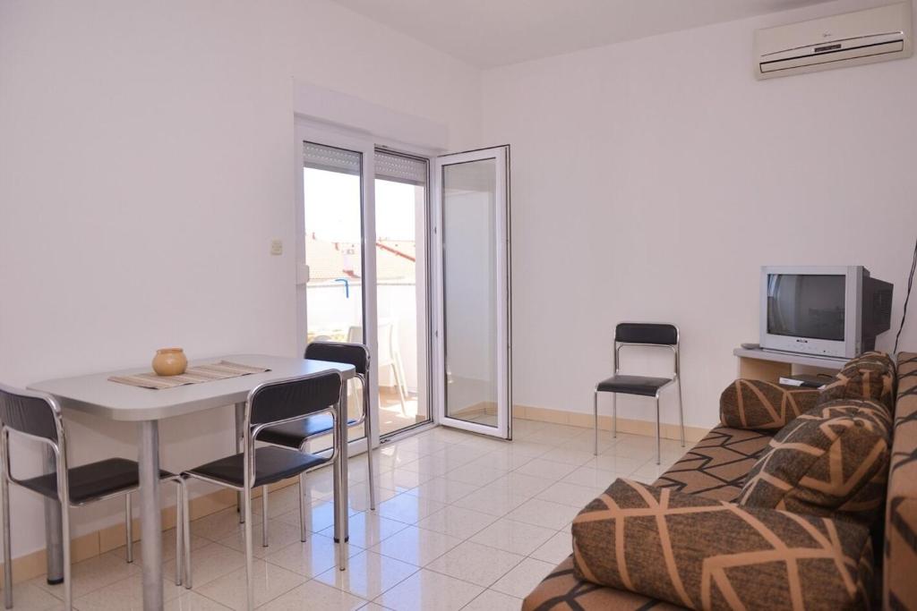Telewizja i/lub zestaw kina domowego w obiekcie Apartments Boris