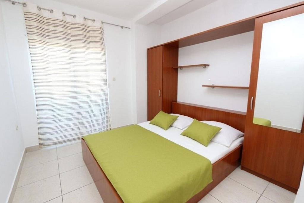 Łóżko lub łóżka w pokoju w obiekcie Apartments Boris