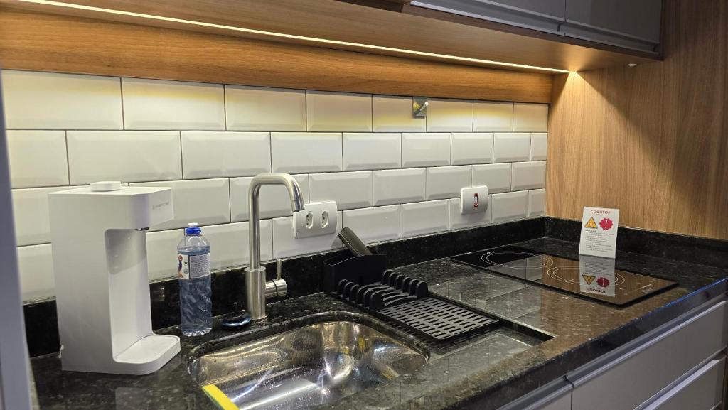 Dapur atau dapur kecil di AP 103 l Com Ar condicionado l Garden l Único