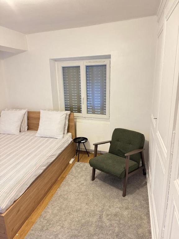 Postel nebo postele na pokoji v ubytování Residence MH Lyon