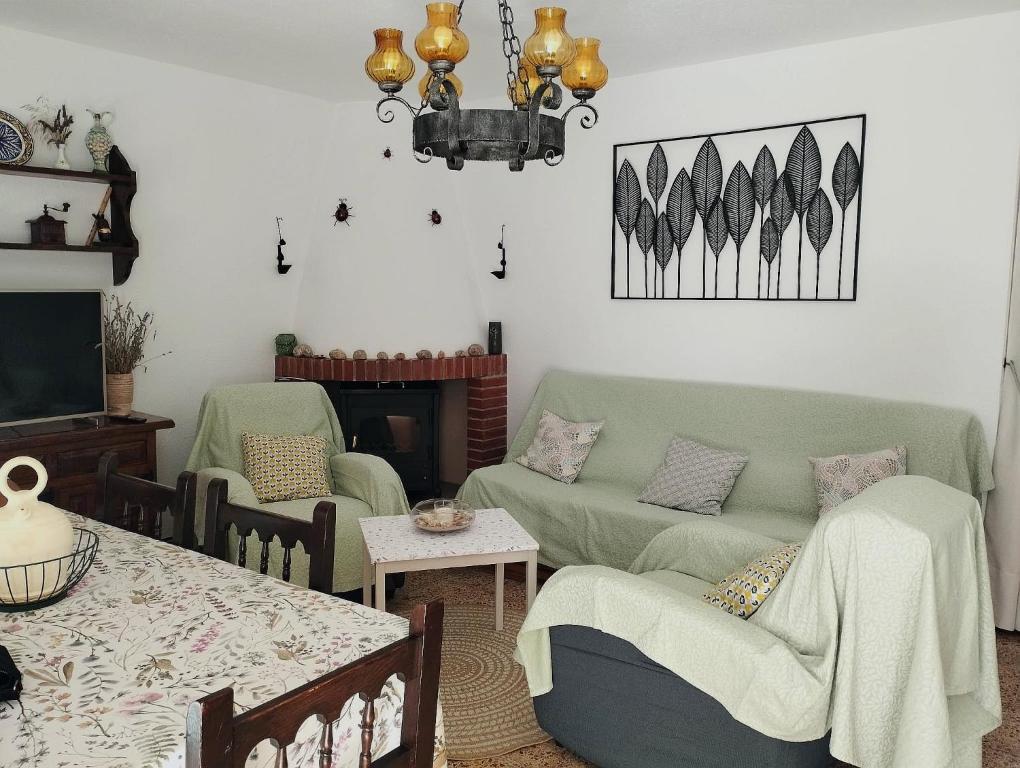 a living room with a couch and a table at Casa Gares in Peñíscola