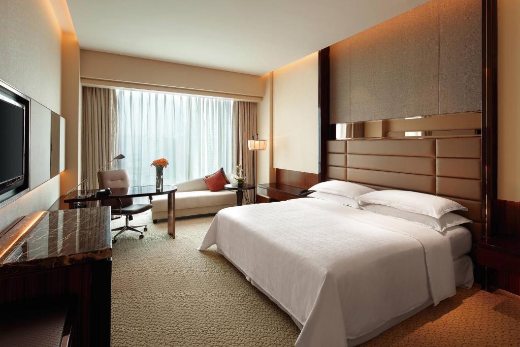 Postel nebo postele na pokoji v ubytování Sheraton Hefei Xinzhan Hotel
