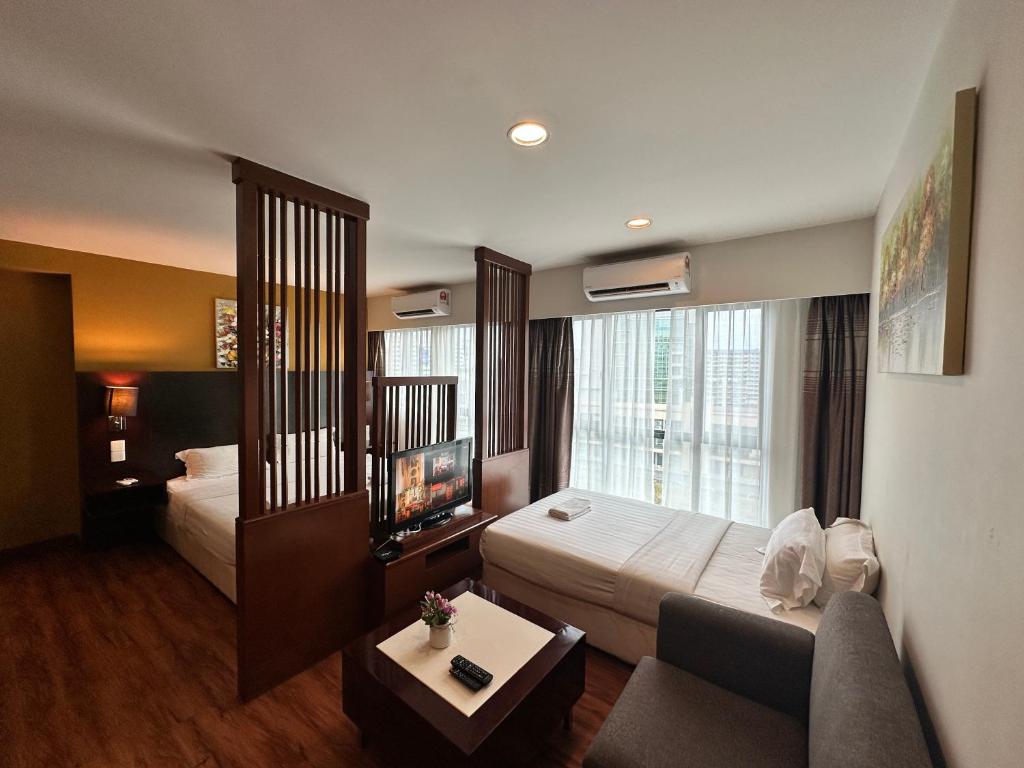 Letto o letti in una camera di Ming Greenage Suite 明绿时代套房 @Kota Kinabalu 亚庇市中心