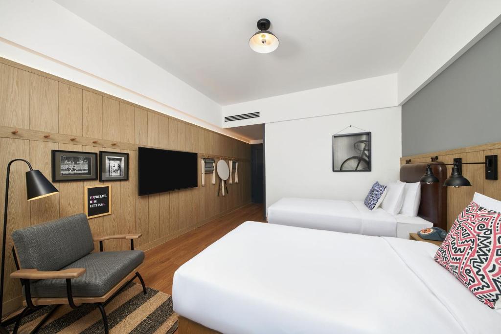 Moxy Nanjing Jiangningにあるテレビまたはエンターテインメントセンター