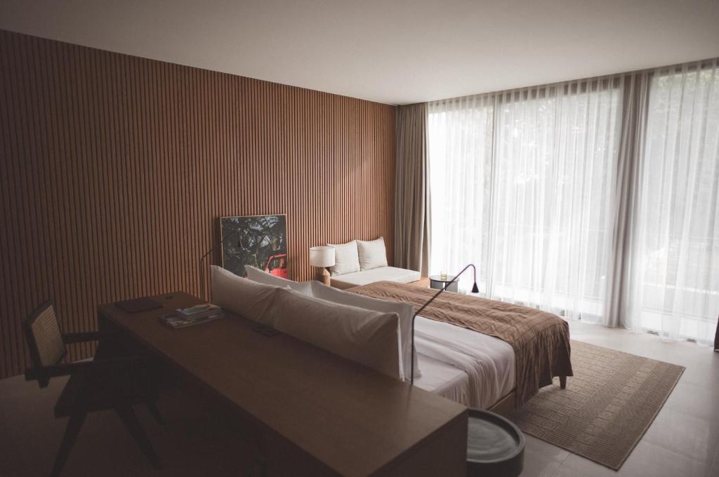 Postel nebo postele na pokoji v ubytování SOKO' Stay at Kedungu