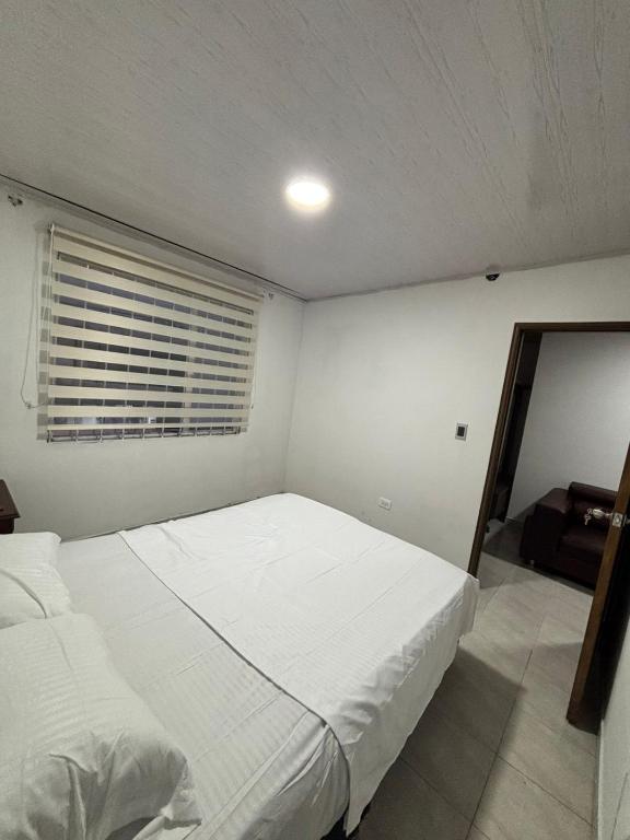 Postel nebo postele na pokoji v ubytování ApartaEstudios Viva, en la vega