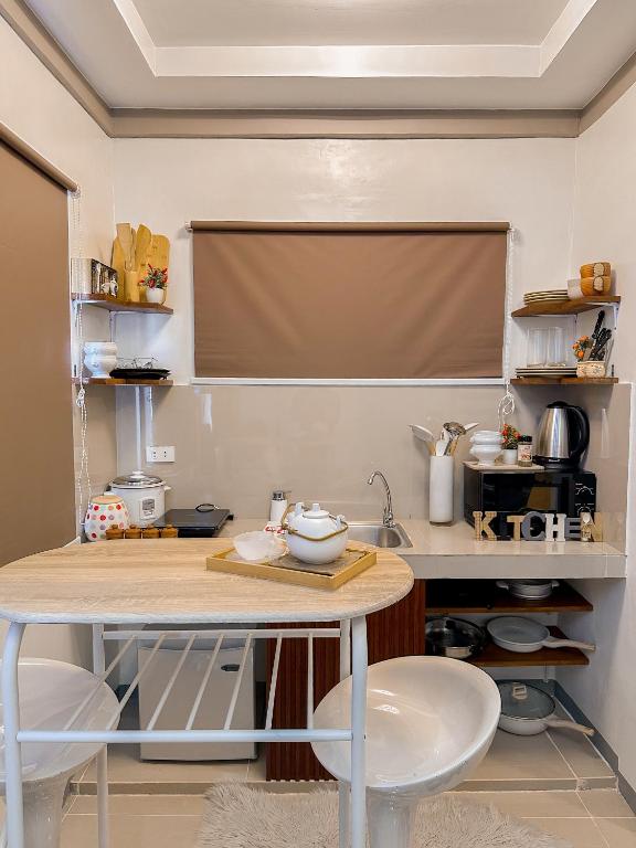 Kuchyň nebo kuchyňský kout v ubytování The Loft