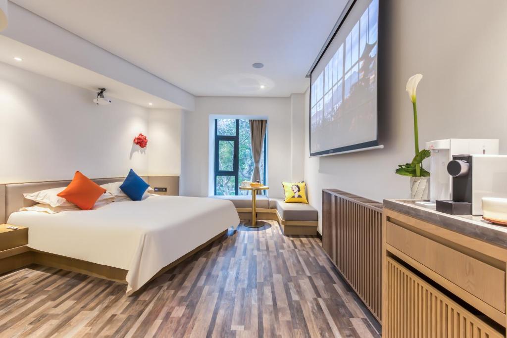 Postel nebo postele na pokoji v ubytování Cozylife Hotel Canal