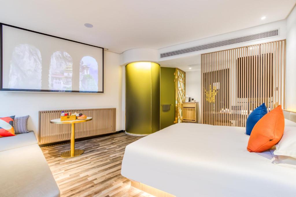 Postel nebo postele na pokoji v ubytování Cozylife Hotel Canal