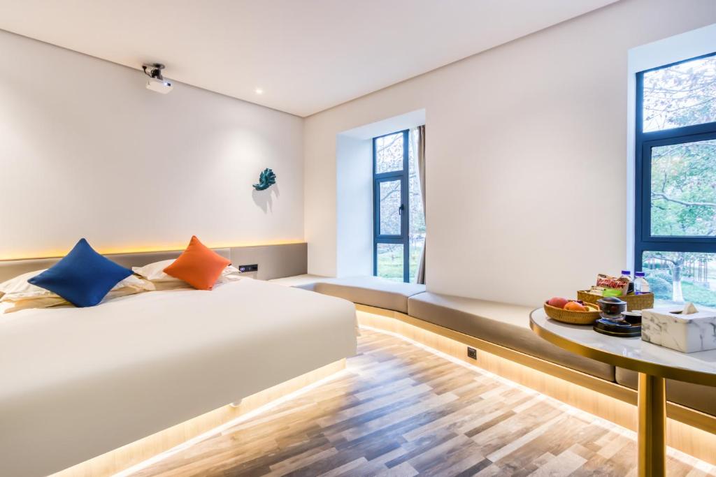 Postel nebo postele na pokoji v ubytování Cozylife Hotel Canal