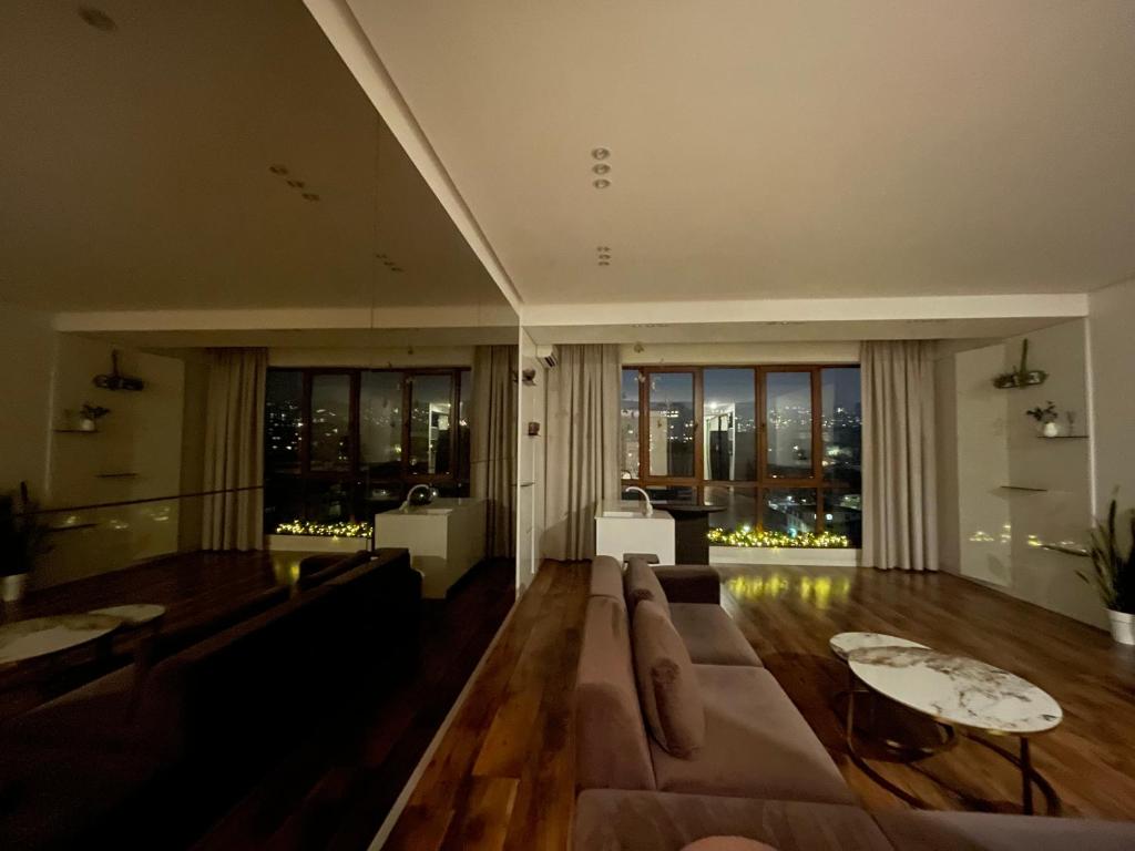 Et opholdsområde på Opera Apartment