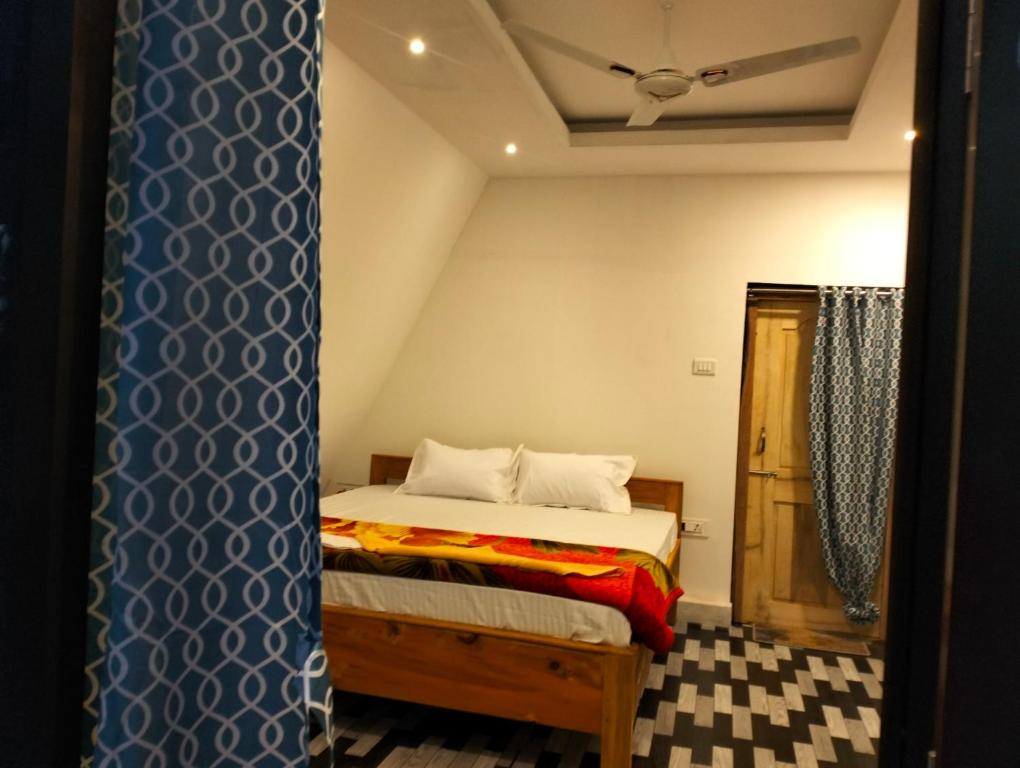 Ένα ή περισσότερα κρεβάτια σε δωμάτιο στο Manas nature hut