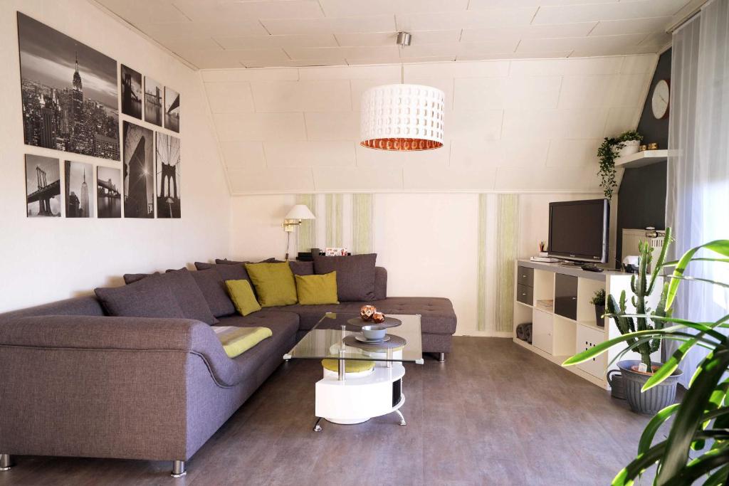 TV a/nebo společenská místnost v ubytování Ferienwohnung "Haus 25" - Zum Golfplatz Tecklenburger Land