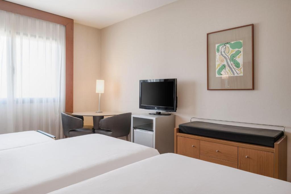 Postel nebo postele na pokoji v ubytování AC Hotel Murcia by Marriott