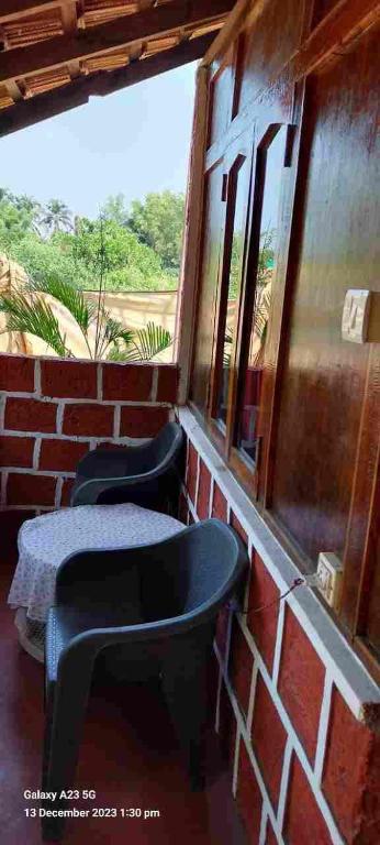 Balkón nebo terasa v ubytování Casa Beach hut Resort