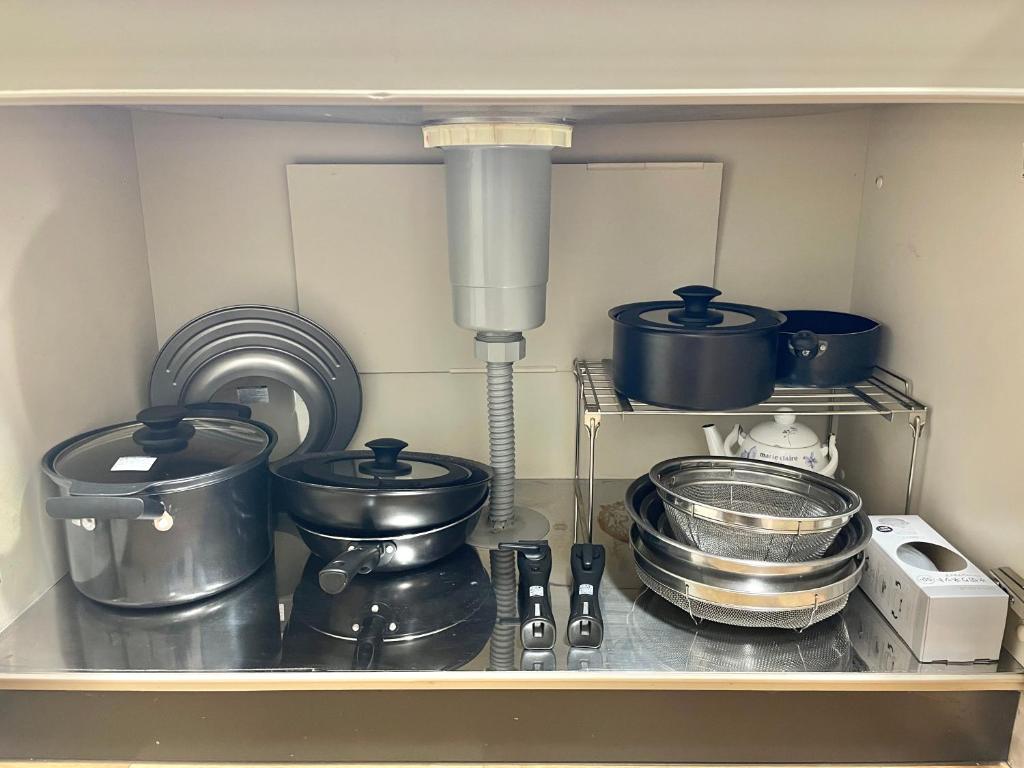 Kuchyň nebo kuchyňský kout v ubytování ユーカラ屋