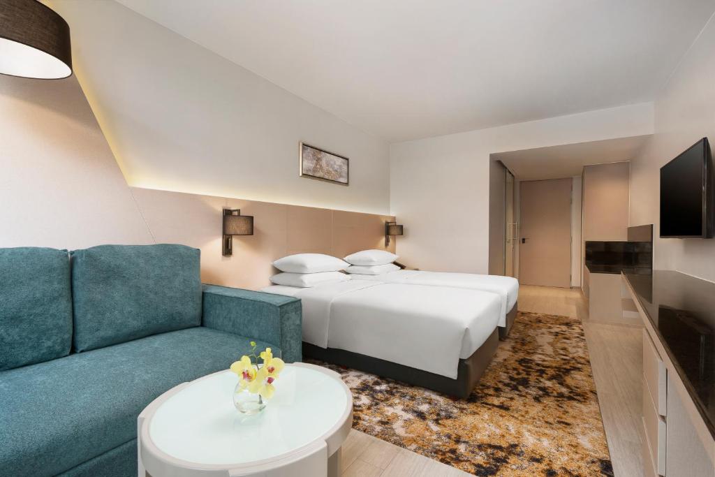 
Deluxe Double Room with Two Single Beds and Sofa Bed
