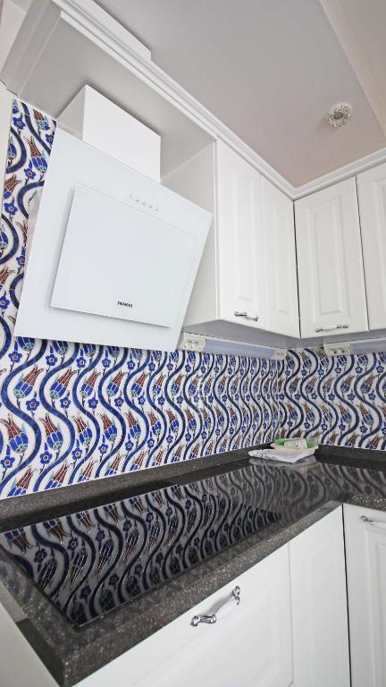 Kuchyň nebo kuchyňský kout v ubytování Excellent Apartments Galata
