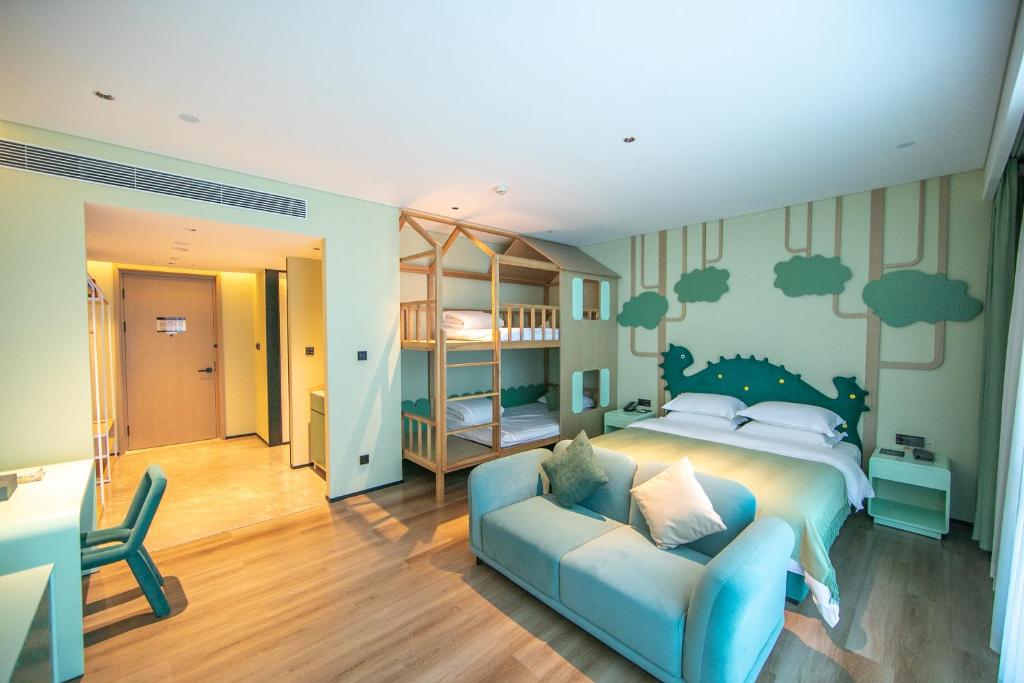 Postel nebo postele na pokoji v ubytování Chaozhou Yuyu Hotel