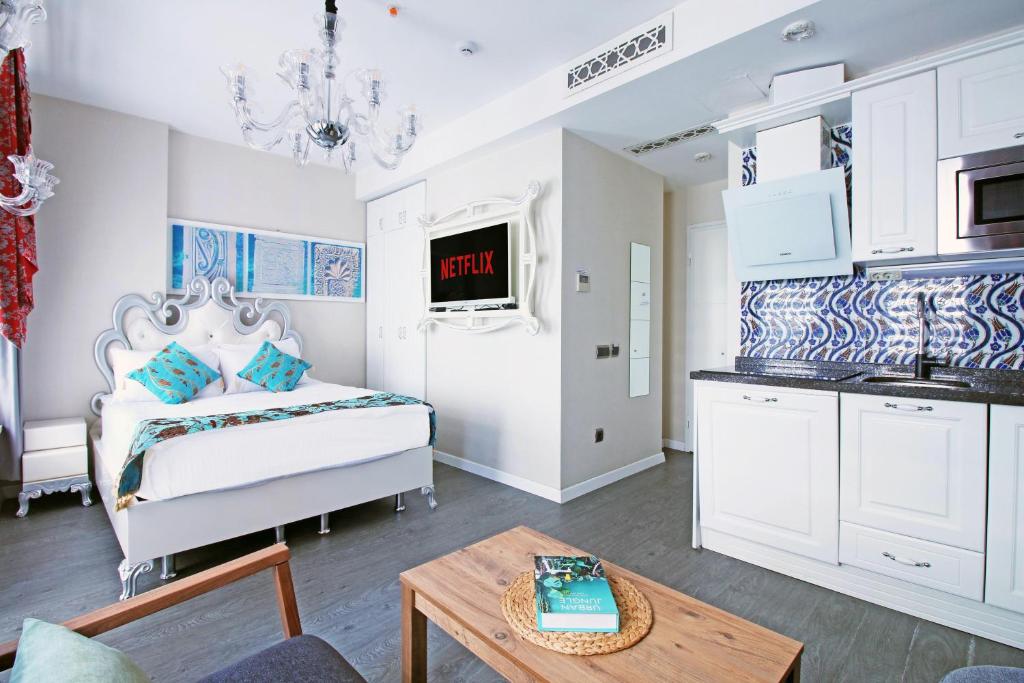 Postel nebo postele na pokoji v ubytování Excellent Apartments Galata