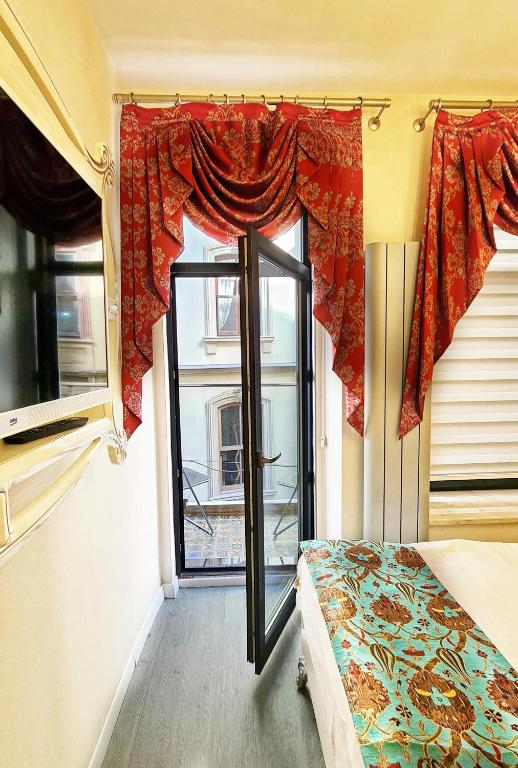 Postel nebo postele na pokoji v ubytování Excellent Apartments Galata