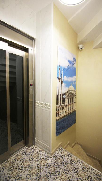 Postel nebo postele na pokoji v ubytování Excellent Apartments Galata