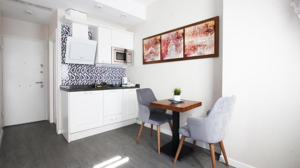 Kuchyň nebo kuchyňský kout v ubytování Excellent Apartments Galata