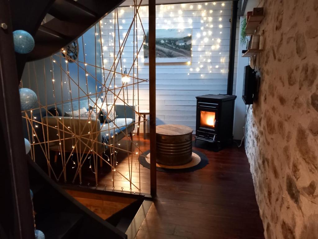 Posezení v ubytování L'Atelier - Gîte urbain chaleureux