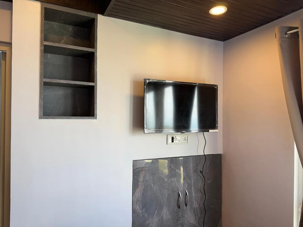 TV a/nebo společenská místnost v ubytování Hotel Basera