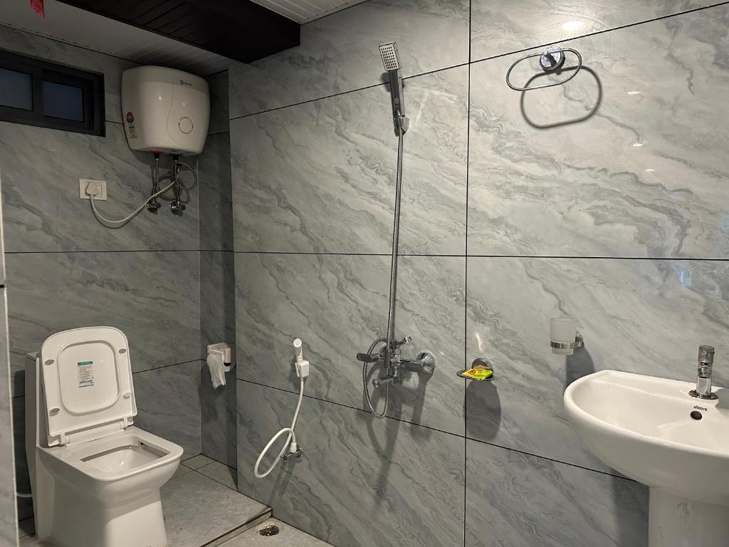 Koupelna v ubytování Hotel Basera