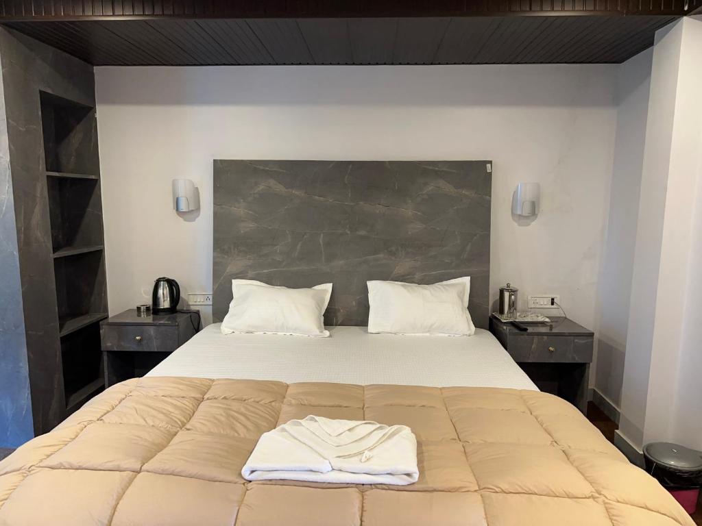 Postel nebo postele na pokoji v ubytování Hotel Basera