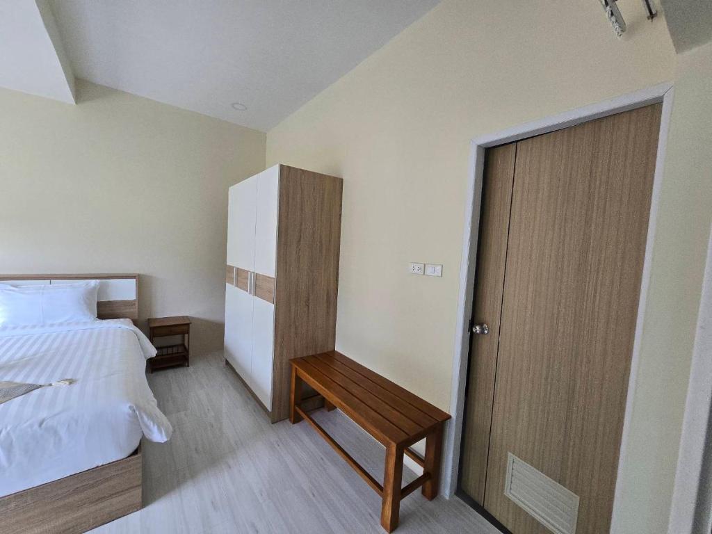 Postel nebo postele na pokoji v ubytování Natural Samui Hotel