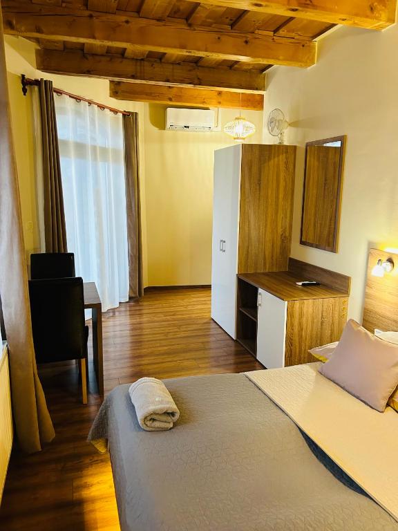 Postel nebo postele na pokoji v ubytování Harmónia Vendégház