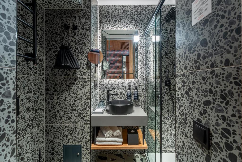 Koupelna v ubytování Aston Hotel Riga