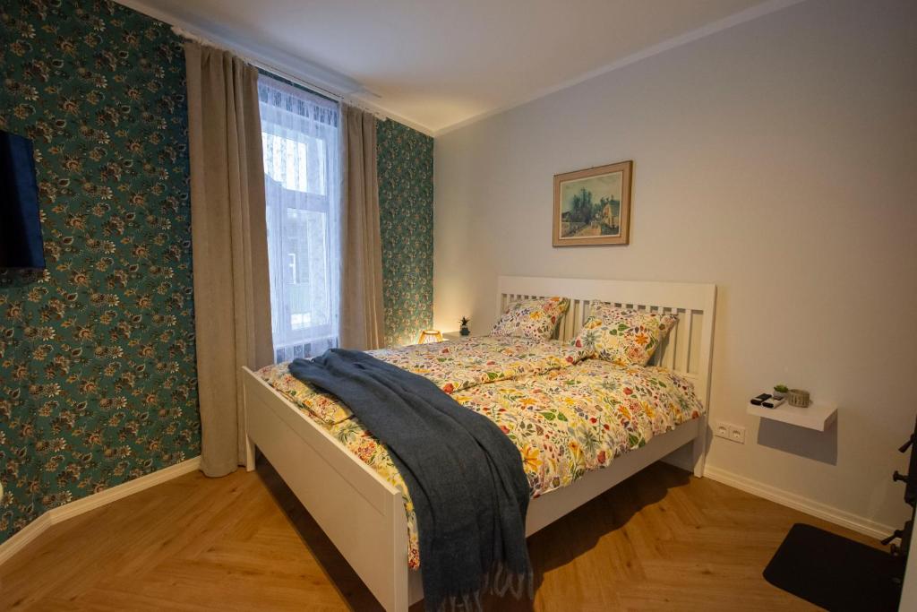 Voodi või voodid majutusasutuse KarlovaIdyll 2A - Tartu Gem Apartment in a Quiet Area & FREE Parking toas