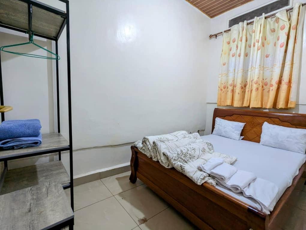 Iwacu 250 - Deluxe Double Room (1 Adult + 1 Child)
