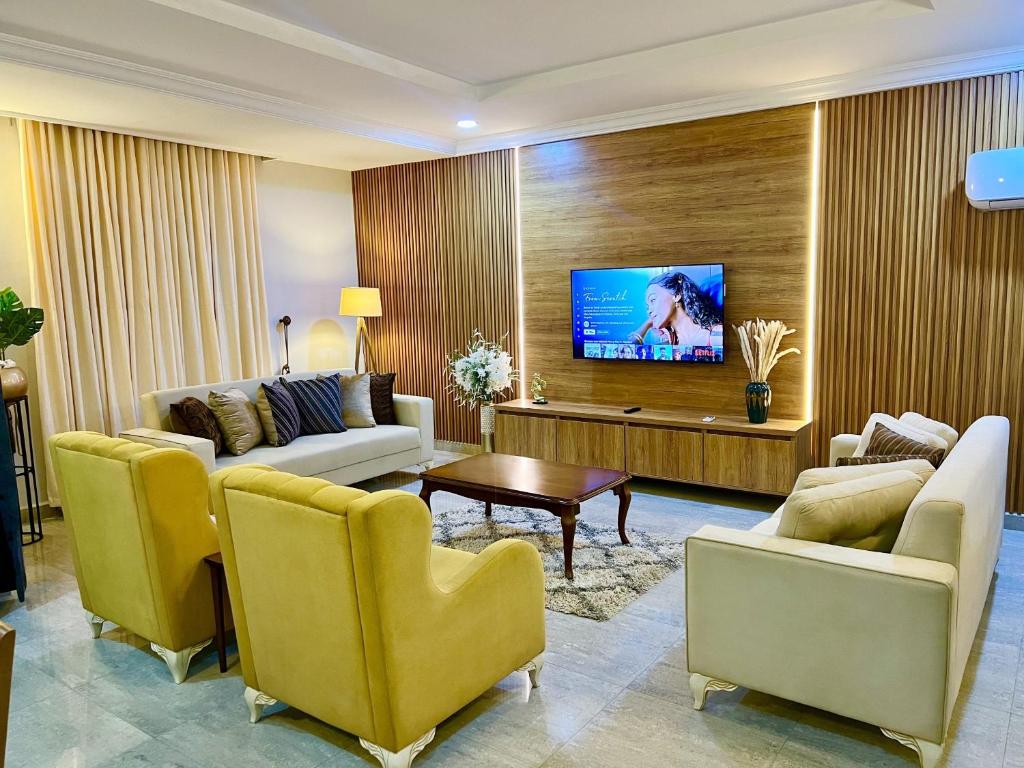 TV a/nebo společenská místnost v ubytování Coshelter Apartments