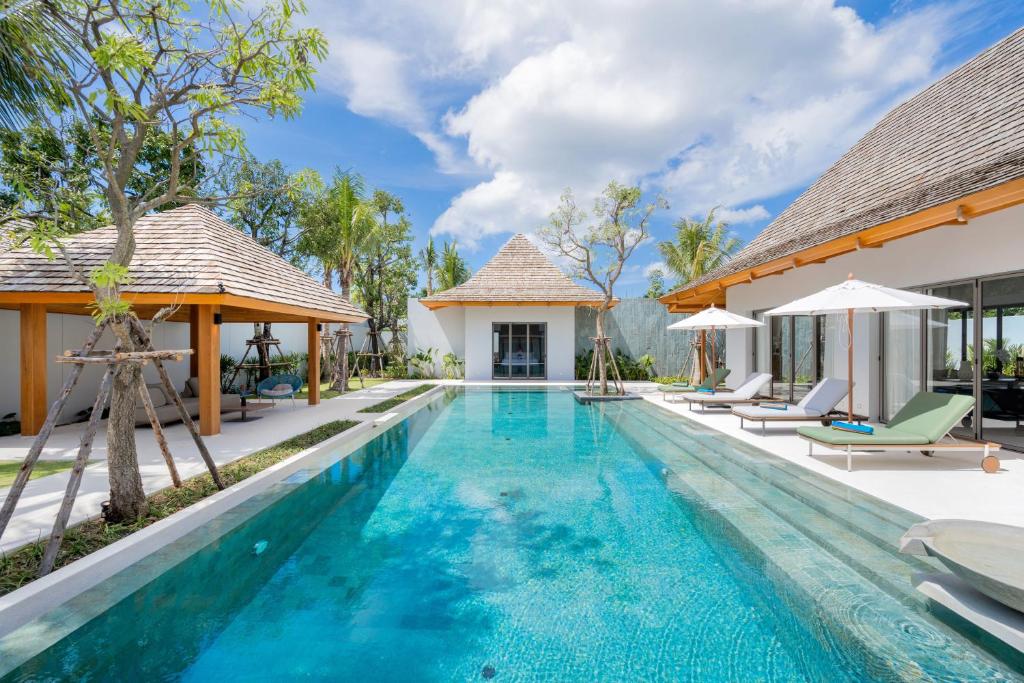 Πισίνα στο ή κοντά στο Spacious 4BR Private 15m Pool Villa Anchan V10 in Gated Residence