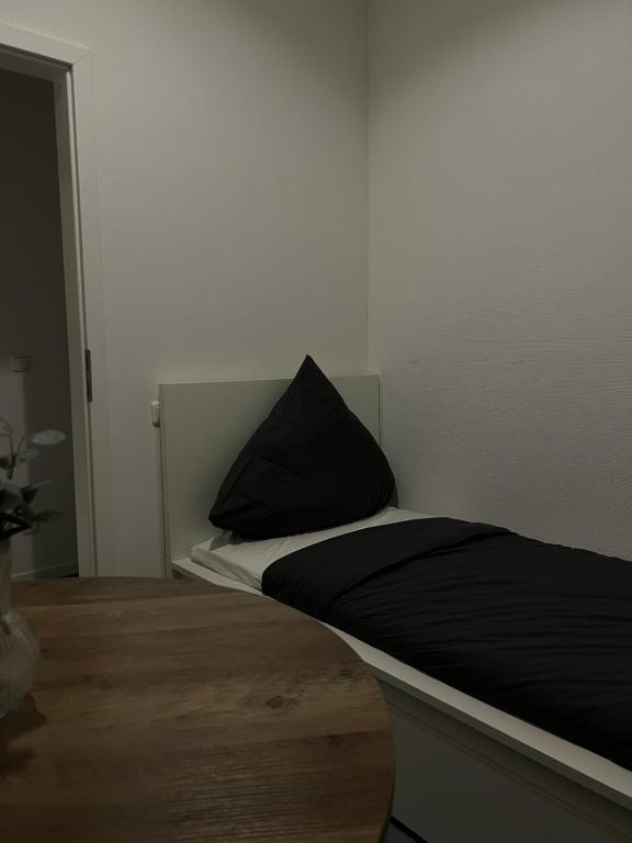 Postel nebo postele na pokoji v ubytování HH Hostels