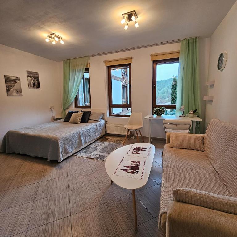 Postel nebo postele na pokoji v ubytování Green life Ski & Spa Studio