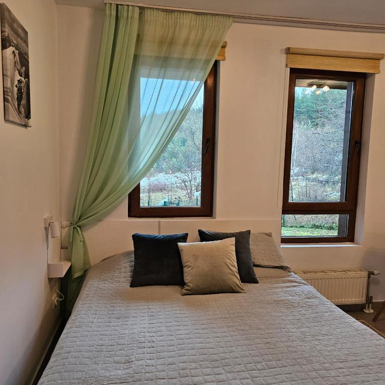 Postel nebo postele na pokoji v ubytování Green life Ski & Spa Studio